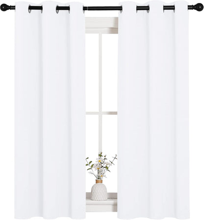 NICETOWN Light Blocking Curtain Panels - Easy-Care Solid Grommet Drapes for Bedroom | 34x54 Inches, White (2 Panels)