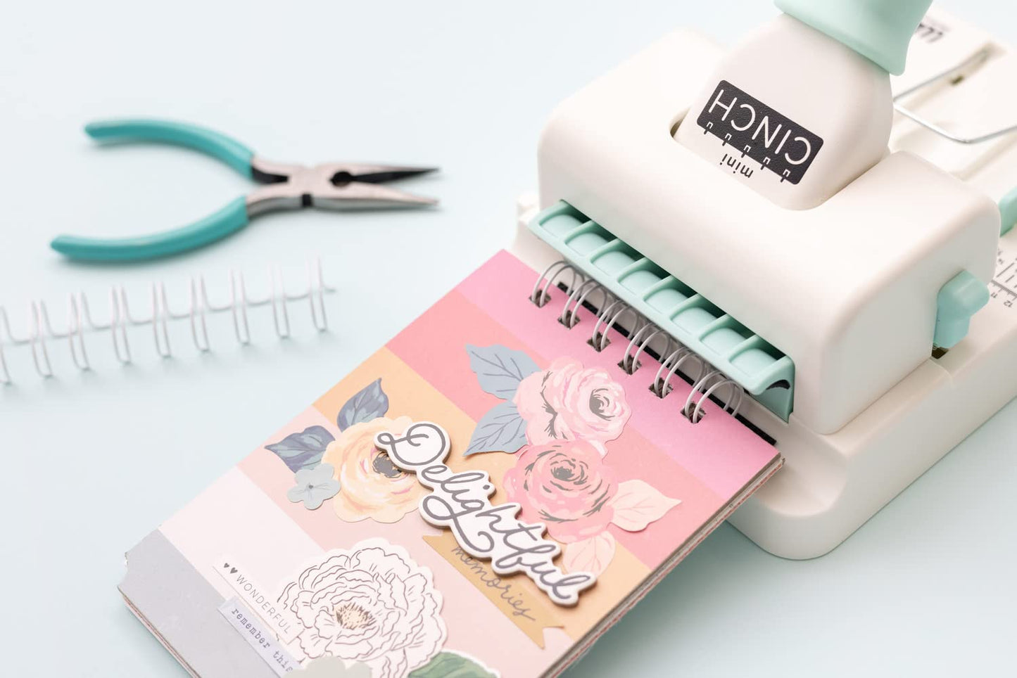 We R Memory Keepers Mini Cinch Bundle Includes Book Binding Machine, 16 Wires, Wire Cutters, and Six Black Bookboards, Easy to Use Design, Ruler, Wire or Spiral Coils, DIY Books, Notebooks, Calendars