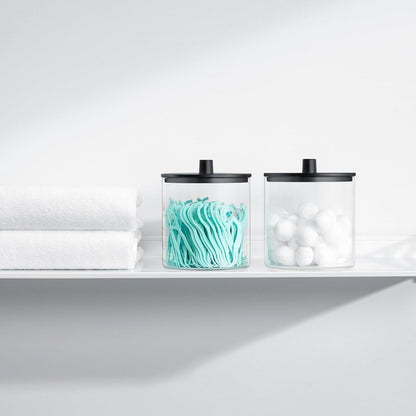 TIPGO Glass Qtip Holder Dispenser - 24 oz Clear Canister Jar, Bathroom Vanity Storage Organizer for Cotton Swabs, Pads, Floss Picks, Small Containers for Makeup Storage (Black)