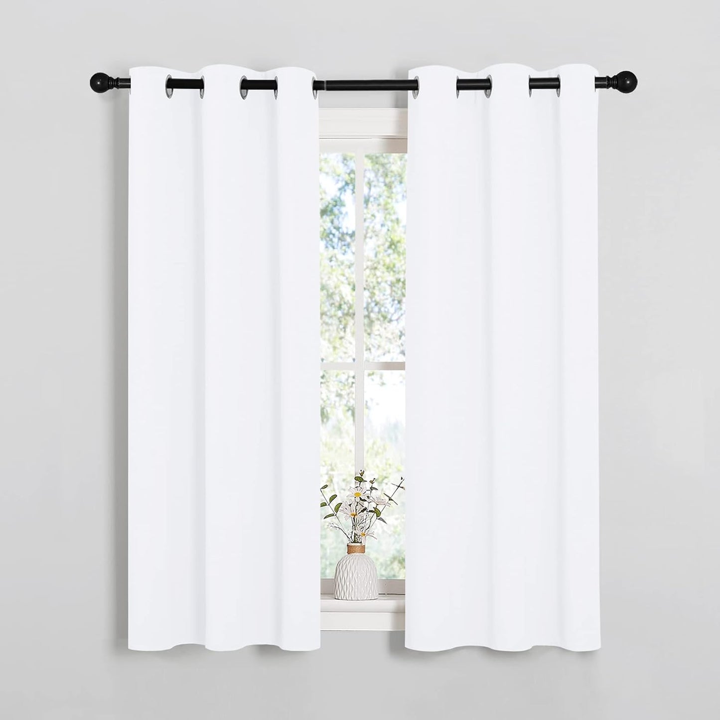 NICETOWN Light Blocking Curtain Panels - Easy-Care Solid Grommet Drapes for Bedroom | 34x54 Inches, White (2 Panels)