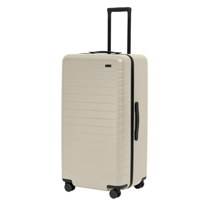 Away Trunk Checked Luggage - 31-Inch Lightweight Hardside Suitcase with 360° WhisperGlide Spinner Wheels, Interior Compression System, TSA-Accepted Lock - Salt White