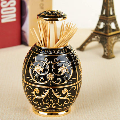 Pssopp Retractable Toothpick Holder, European Vintage Egg Shaped Toothpick Dispenser with Fully Sealed Design and Elegant Flower Carvings, Tin Alloy Storage Container for Home (Golden Black Glue)