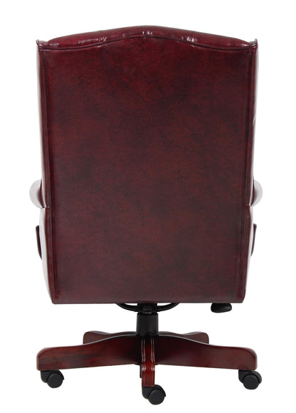 Scranton & Co Traditional Faux Leather Executive Chair, 30" W x 32" D x 41-44" H, Oxblood Red Finish, Tufted Wingback Design, Mahogany Wood Accents, Adjustable Height, Office Desk Chair