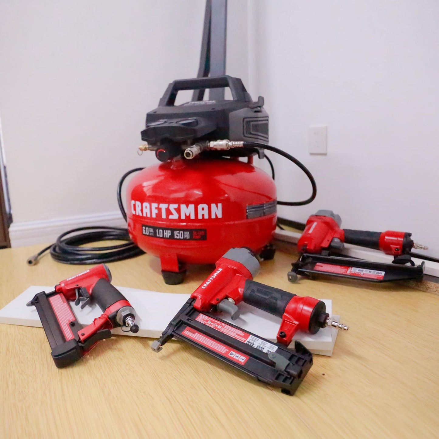 Craftsman 6-Gallon Pancake Air Compressor 4-Tool Combo Kit, 150 PSI, Oil-Free, Includes 16GA Finish Nailer, 18GA Brad Nailer, 23GA Pin Nailer & 25-Ft Air Hose, Model CMXECXA0210641K