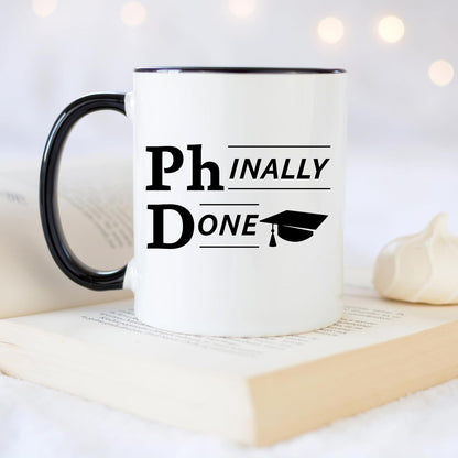 YouNique Designs Phinally Done 11 Ounces PhD Graduation Mug, Funny Doctorate Graduation (Black Handle)