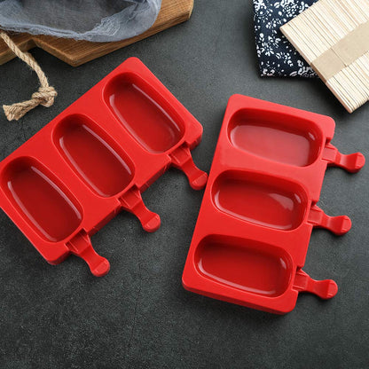 Mirenlife 3 Cavities Silicone Popsicle Molds with Lid, BPA Free Homemade Ice Cream Bar Mold Ice Pop Molds DIY Cakesicle Molds Silicone with 50 Wooden Sticks, Set of 2 (Oval)
