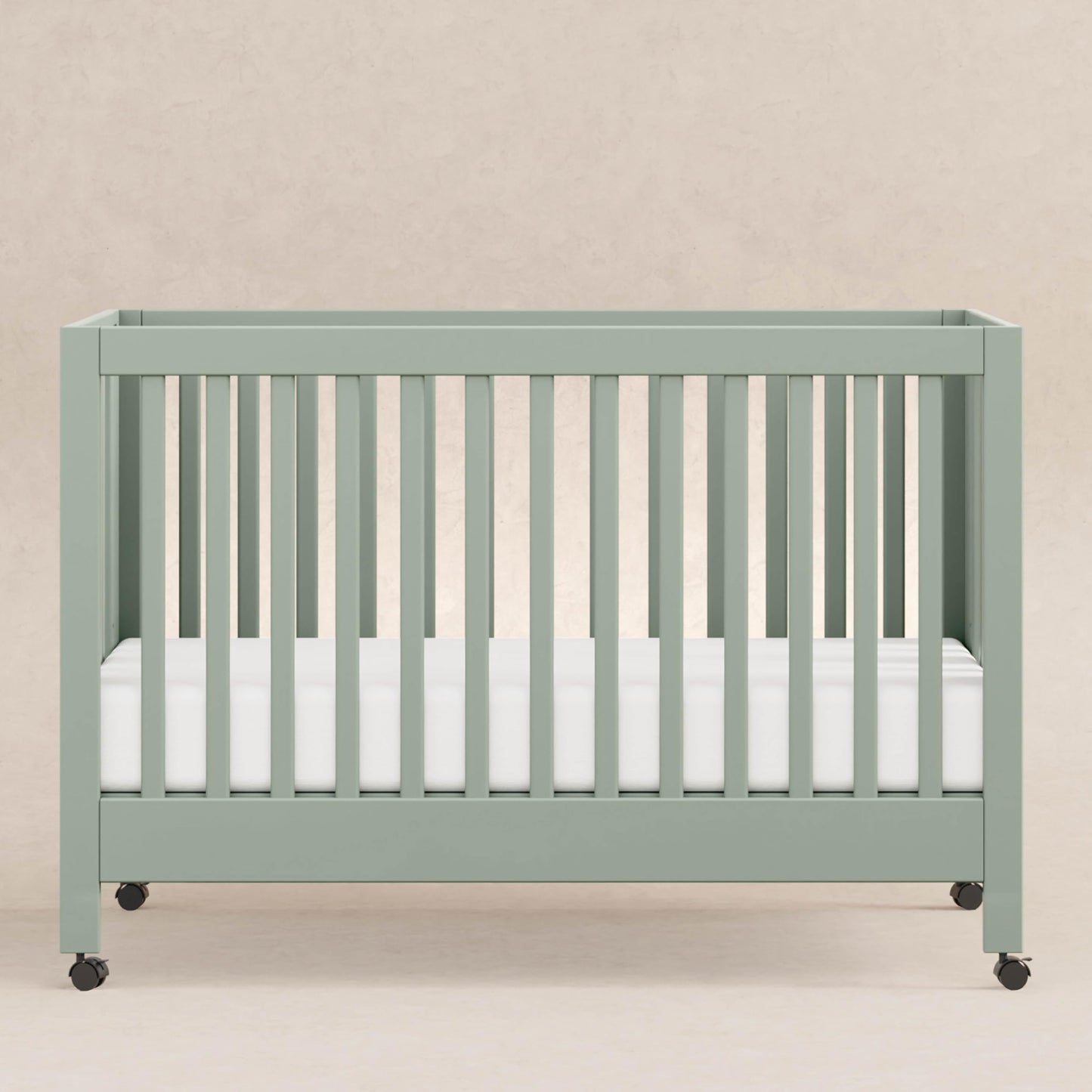 Babyletto Maki Full-Size 2-in-1 Portable Folding Crib with Toddler Bed Conversion Kit in Light Sage, Greenguard Gold Certified