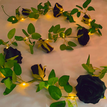 Fielegen 6.56 FT Halloween Artificial Black Rose Vine Lights Fake Floral Garland Wall Decoration Faux Plants Rose Vine with 20 LED Fairy Lights Battery Operated String Lights for Garden Wedding Decor