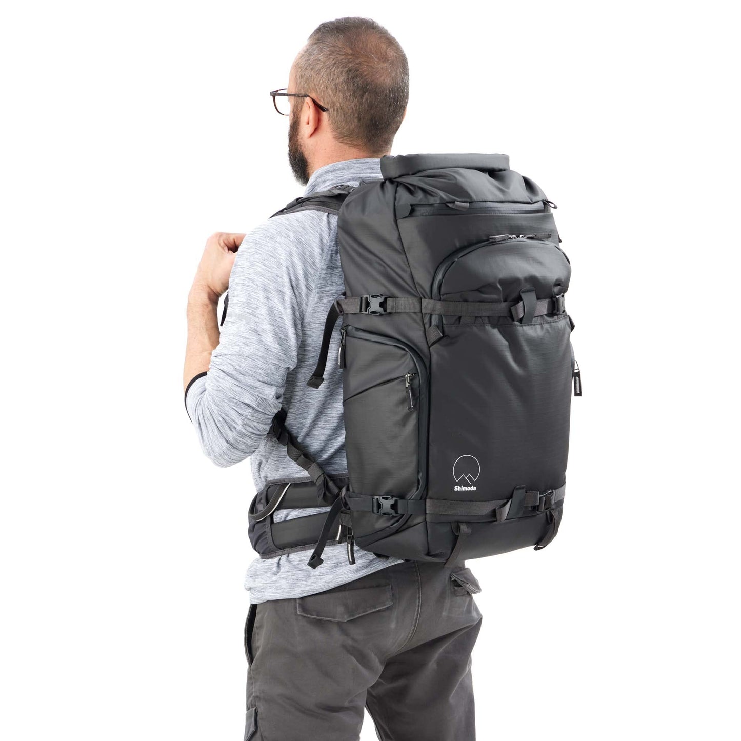 Shimoda Action X30 v2 Starter Kit, Outdoor Photography Adventure Pack for mirrorless and DSLR cameras, includes Medium Mirrorless Core Unit, Expandable Rolltop, 16" Laptop Sleeve, Black