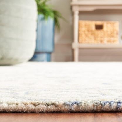 SAFAVIEH Dip Dye Collection Area Rug - 10' x 14', Light Blue & Ivory, Handmade Wool, Ideal for High Traffic Areas in Living Room, Bedroom (DDY901L)