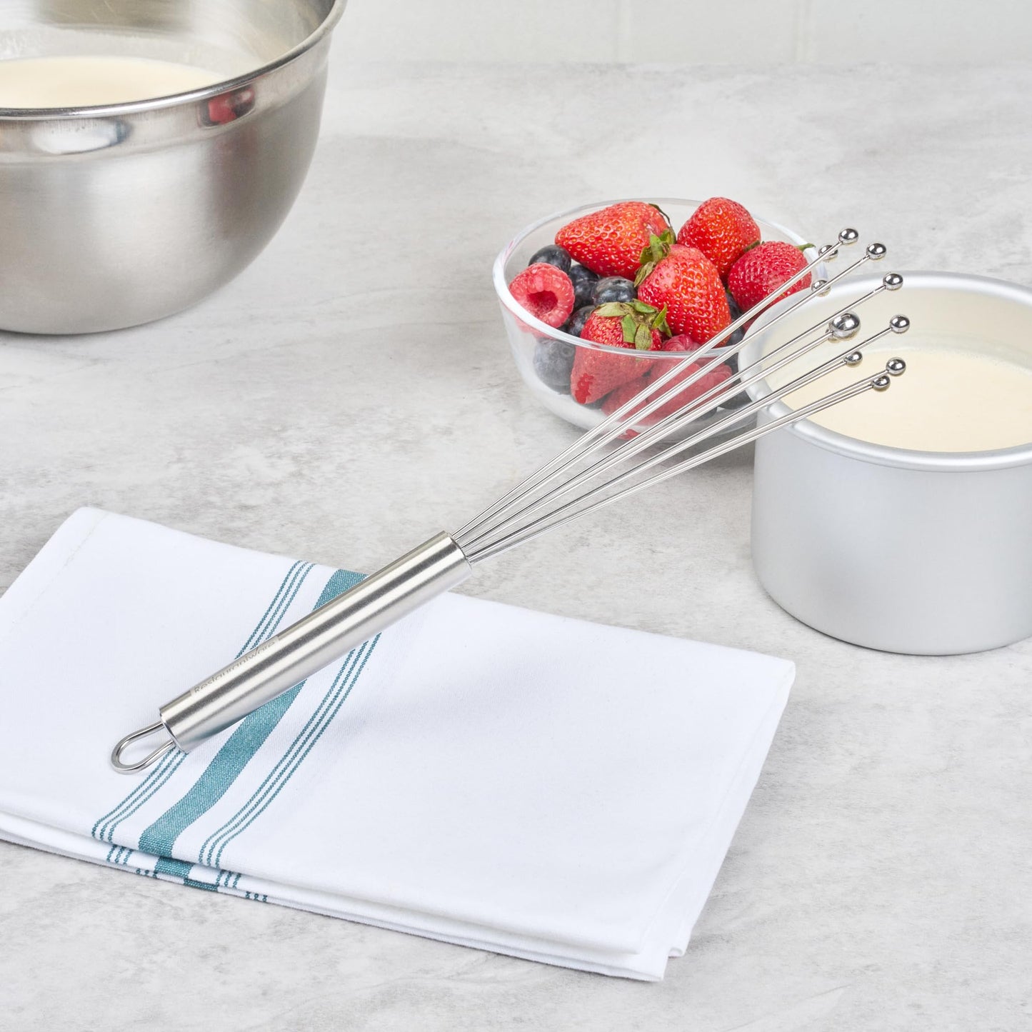 Restaurantware 10.5 in Stainless Steel Ball Whisk - German Standard Egg Beater with Ergonomic Handle, Dishwasher Safe - Manual Mixer Cooking Whisk for Baking, Stirring, Sauces, Beating