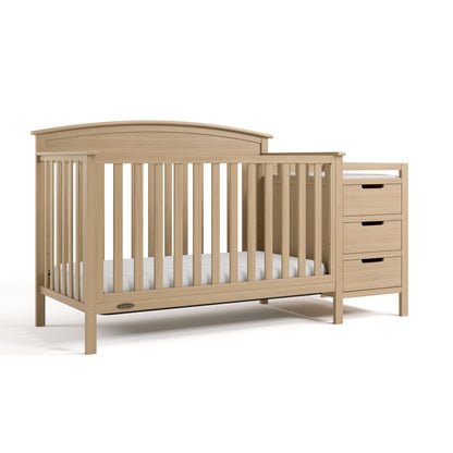 Graco Benton 4-in-1 Convertible Crib and Changer – GREENGUARD Gold Certified, Crib & Changing-Table Combo, Water-Resistant Changing Pad, Converts to Toddler Bed, Daybed and Full-Size Bed (Driftwood)
