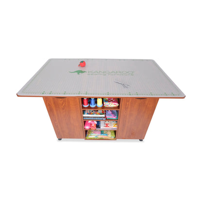 Kangaroo Kookaburra Cutting Table – Large Sewing, Quilting & Craft Workstation with Expandable 70” x 40” Surface, Storage Drawers, Shelves & Rolling Locking Casters, Teak Finish