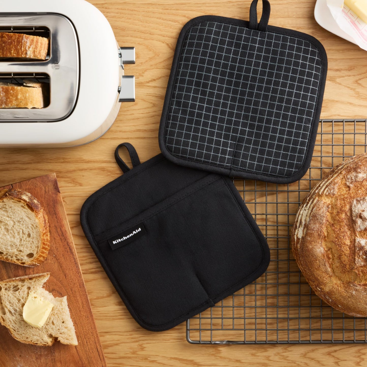 KITCHENAID Gourmet Series Gridlines Pot Holders 2-Pack Set, Heat Resistant up to 600°F, Soft Silicone Grip, Magnetic Cuff, Matte Black, 8"x8"