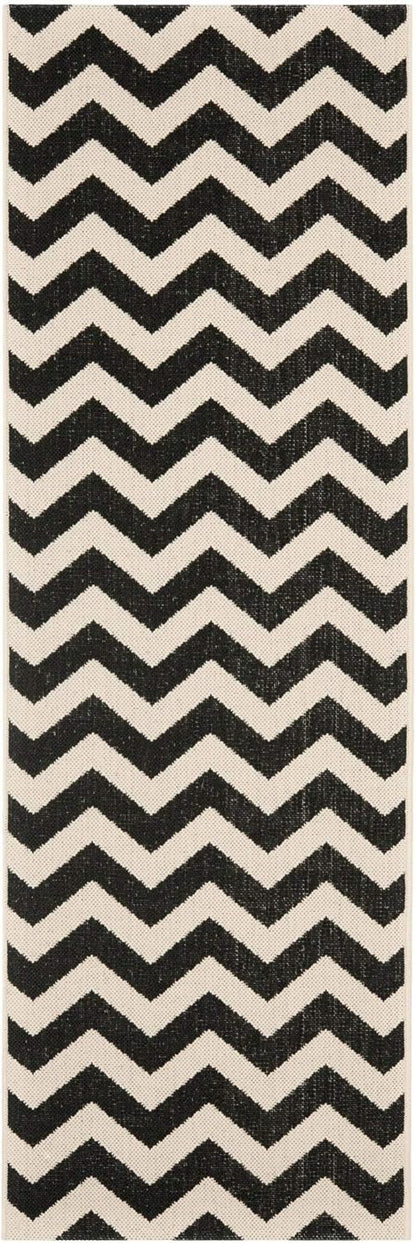 SAFAVIEH Courtyard Collection Runner Rug - 2'3" x 6'7", Black & Beige, Chevron Design, Non-Shedding & Easy Care,