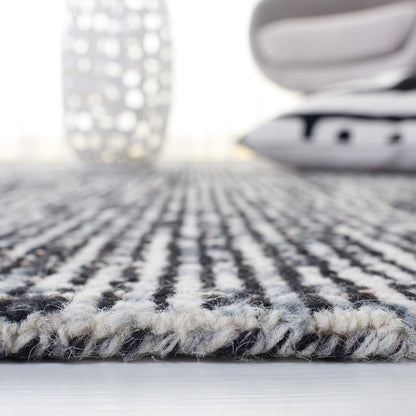 SAFAVIEH Abstract Collection Area Rug - 9' x 12', Black & Grey, Handmade Wool, Ideal for High Traffic Areas in Living Room, Bedroom (ABT468L)