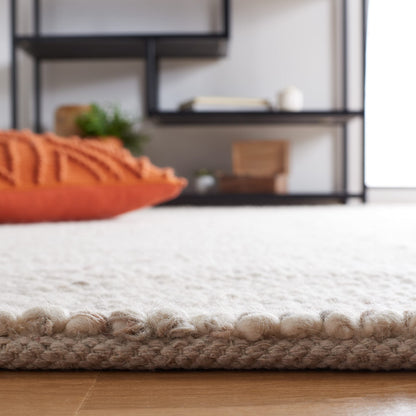 SAFAVIEH Natura Collection Area Rug - 6' x 9', Beige & Ivory, Handmade Wool, Ideal for High Traffic Areas in Living Room, Bedroom (NAT182B)