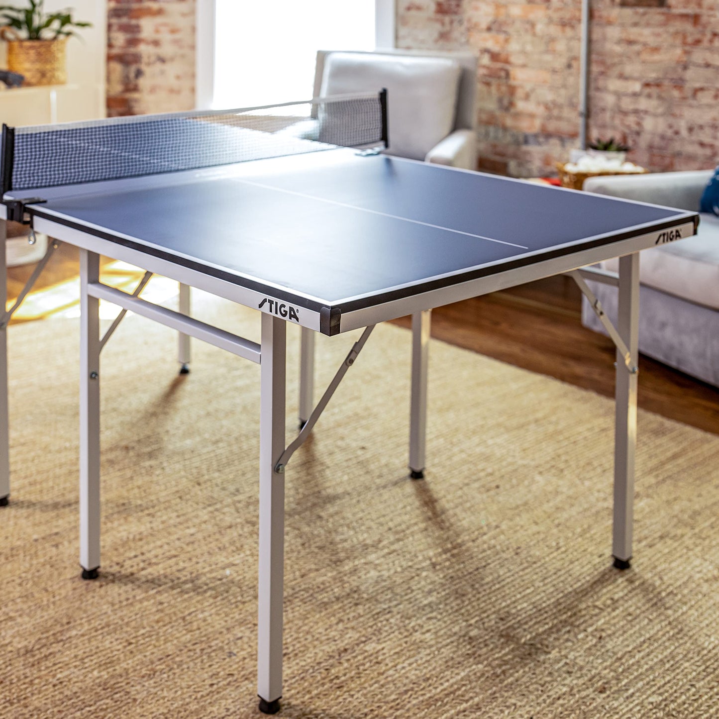 STIGA Space Saver - Mid-Size Portable Table Tennis Table - Compact Storage Fits in Most Closets – Includes Ping-Pong Net & Post - No Assembly Required