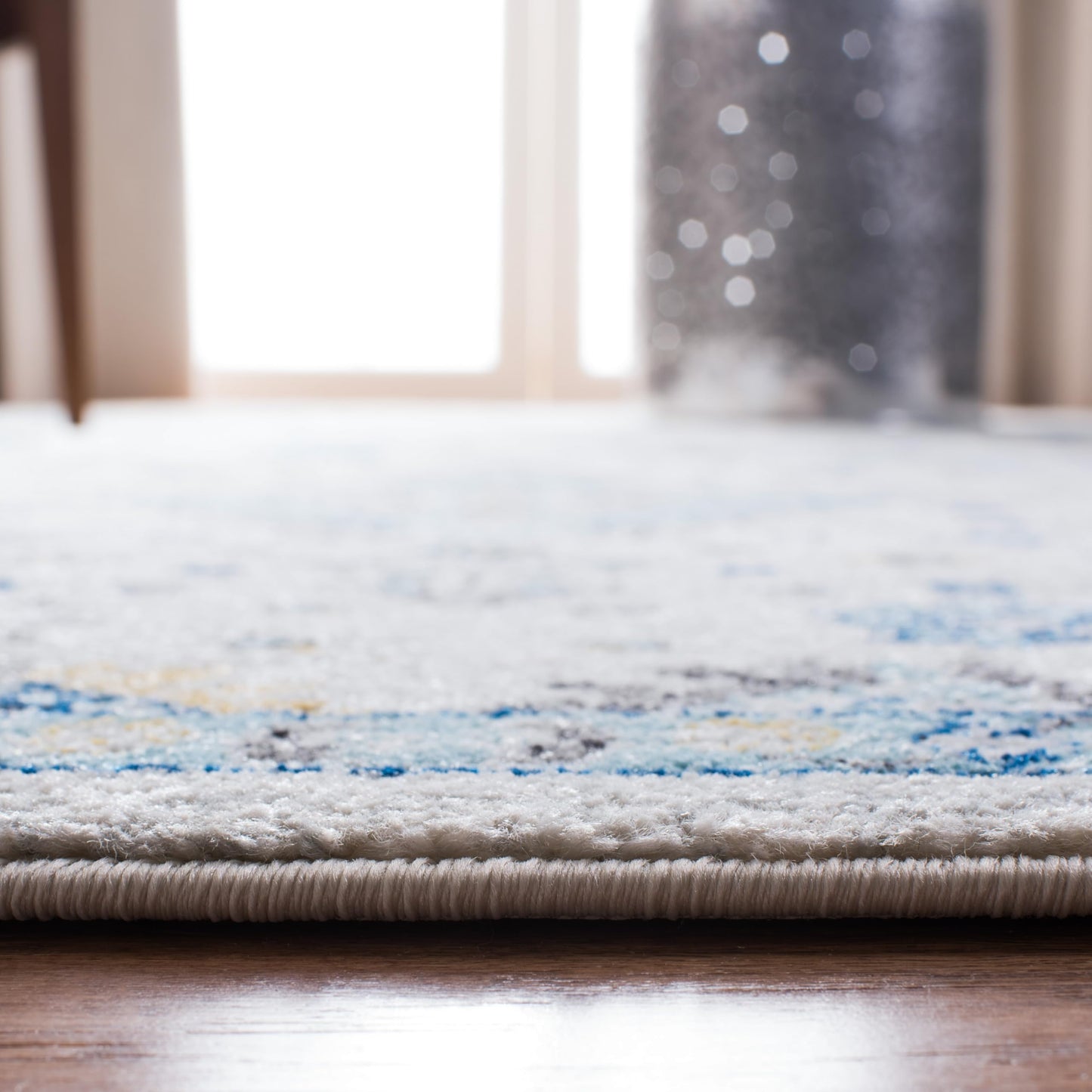 SAFAVIEH Evoke Collection 10' x 14' Ivory / Light Blue EVK224C Boho Oriental Non-Shedding Living Room Bedroom Dining Home Office Area Rug