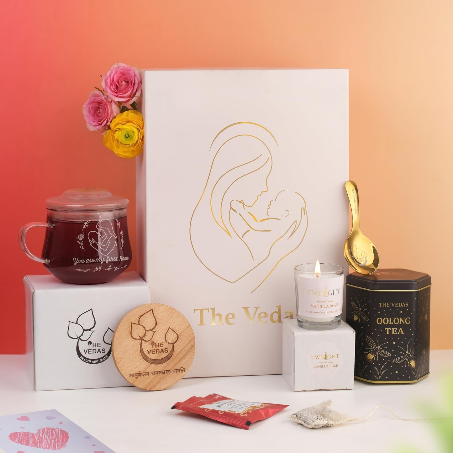 The Vedas Gift For MOM | Mothers day gift | 22 items teagift | 8 Different Flavours teabags | 1 Luxury Oolong tea tin Caddy | total 56 Cups of tea | 1 Glass Mug for MOM With lid and Infuser | 1 Scented Candle | 1 Branded Spoon | 1 Wooden Coaster