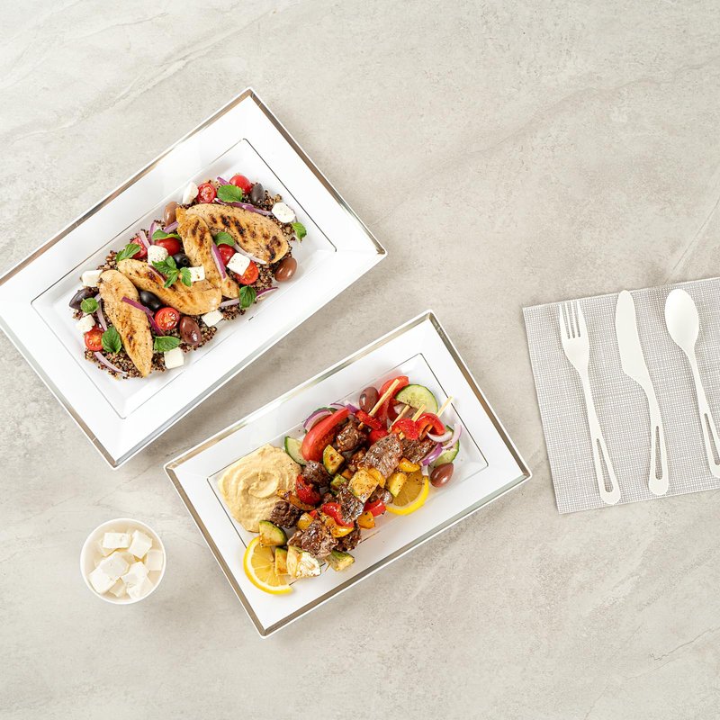 Restaurantware Moderna 11.5 x 7.3 Inch Premium Disposable Plates 100 Rectangular Plastic Plates For Parties - Silver-Rimmed Durable White Plastic Dinner Plates For Warm And Cold Foods
