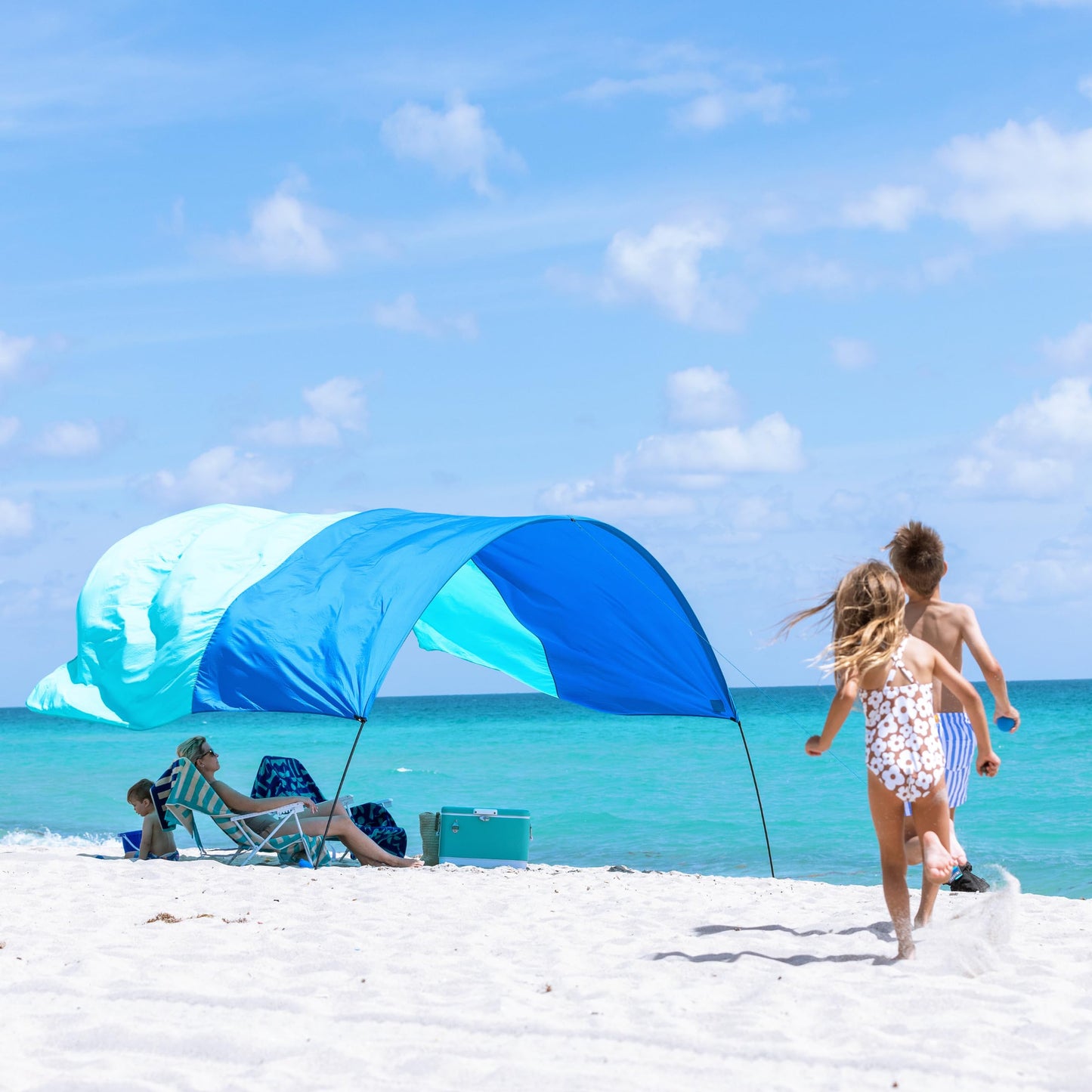 Shibumi Shade 3.0 Version | Wind-Powered Beach Tent Shade Canopy | Sets Up in 3 Mins | 150 Sq. Ft. of Shade for up to 8 People | Includes Wind Assist | UPF 50+ Sun Protection