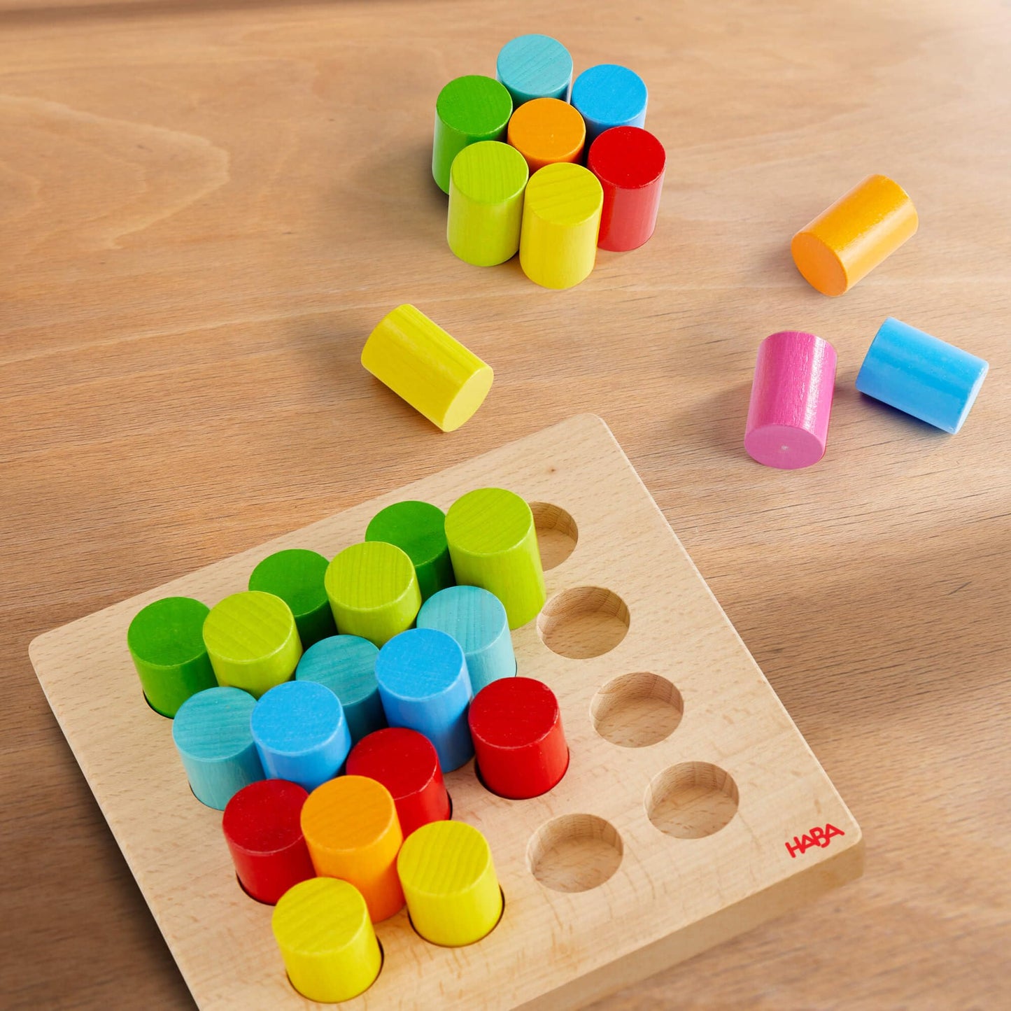 HABA Rainbow Risers Wooden Stacking Game: Montessori Toys for 2 Year Old & Up, Shape Sorter & Wooden Pegboard Preschool Learning Toys with Challenge Cards