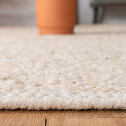 SAFAVIEH Area Rug 8x10 - Natura Collection - Large - Ivory, Handmade Wool, Ideal for Living Room, Bedroom, Dining Space (NAT263A)