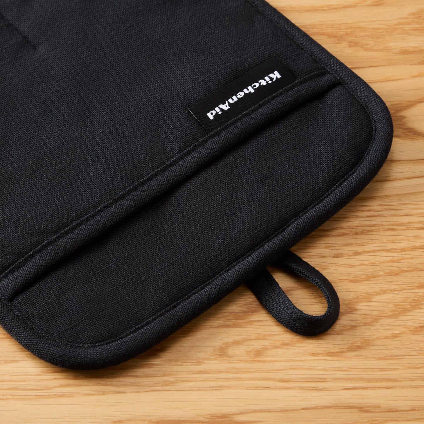 KITCHENAID Gourmet Series Gridlines Pot Holders 2-Pack Set, Heat Resistant up to 600°F, Soft Silicone Grip, Magnetic Cuff, Matte Black, 8"x8"