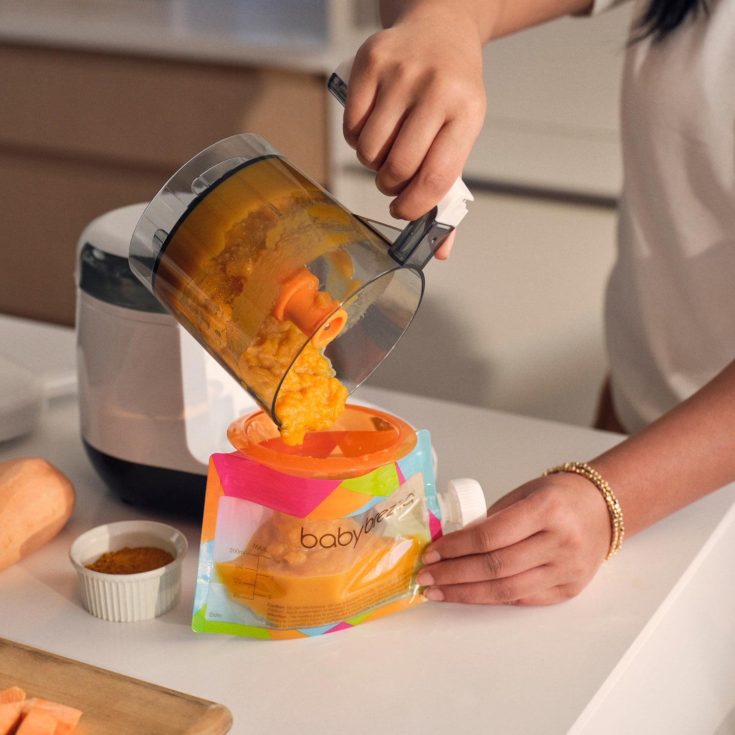 Baby Brezza One Step Baby Food Maker Deluxe – Auto shut Off, Dishwasher Safe Cooker and Blender to Steam + Puree Organic Food for Infants + Toddlers - Set of 3 Pouches + 3 Funnels