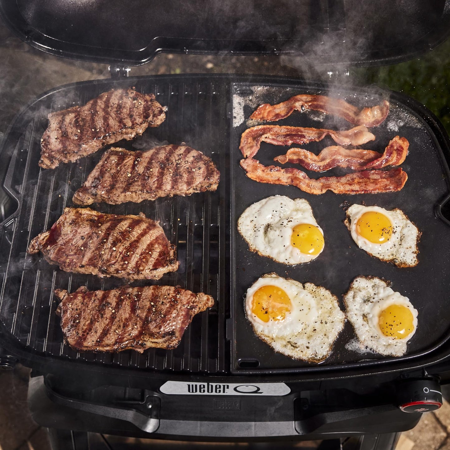 Weber Q 2800N+ Liquid Propane Portable Grill, Charcoal Grey – Wide 250°–700°F Temp Range with Plus Burner for Searing, Low‑Temp Roasting & High-Dome Lid for Travel & Camping
