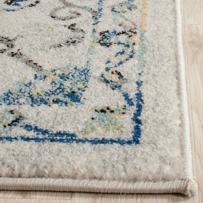 SAFAVIEH Evoke Collection Accent Rug (2'2" x 4', Ivory & Blue, Boho Design, Non-Shedding, Easy Care)