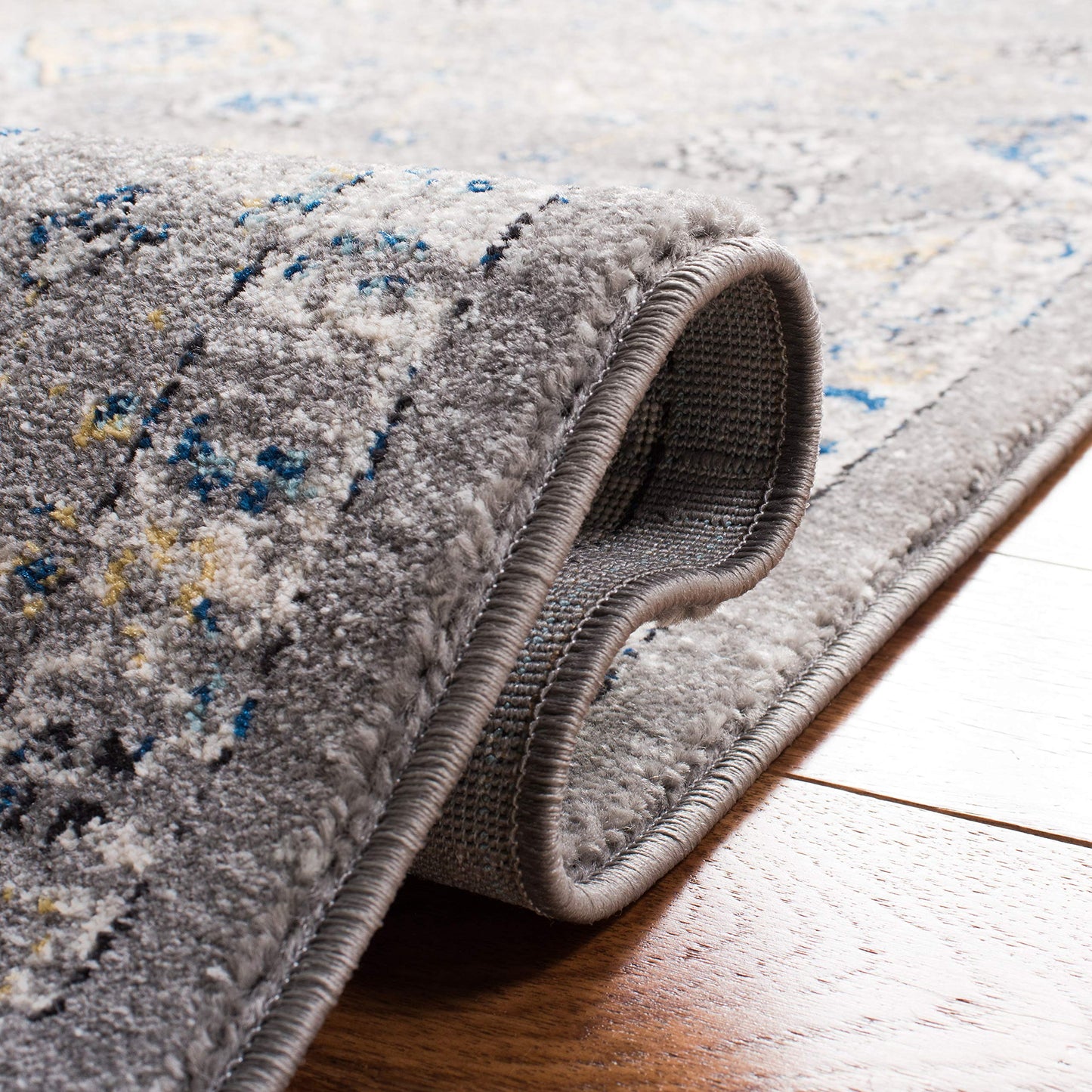 SAFAVIEH Evoke Collection Area Rug - 10' x 14', Dark Grey & Yellow, Boho Oriental Design, Non-Shedding & Easy Care, Ideal for High Traffic Areas in Living Room, Bedroom (EVK224G)