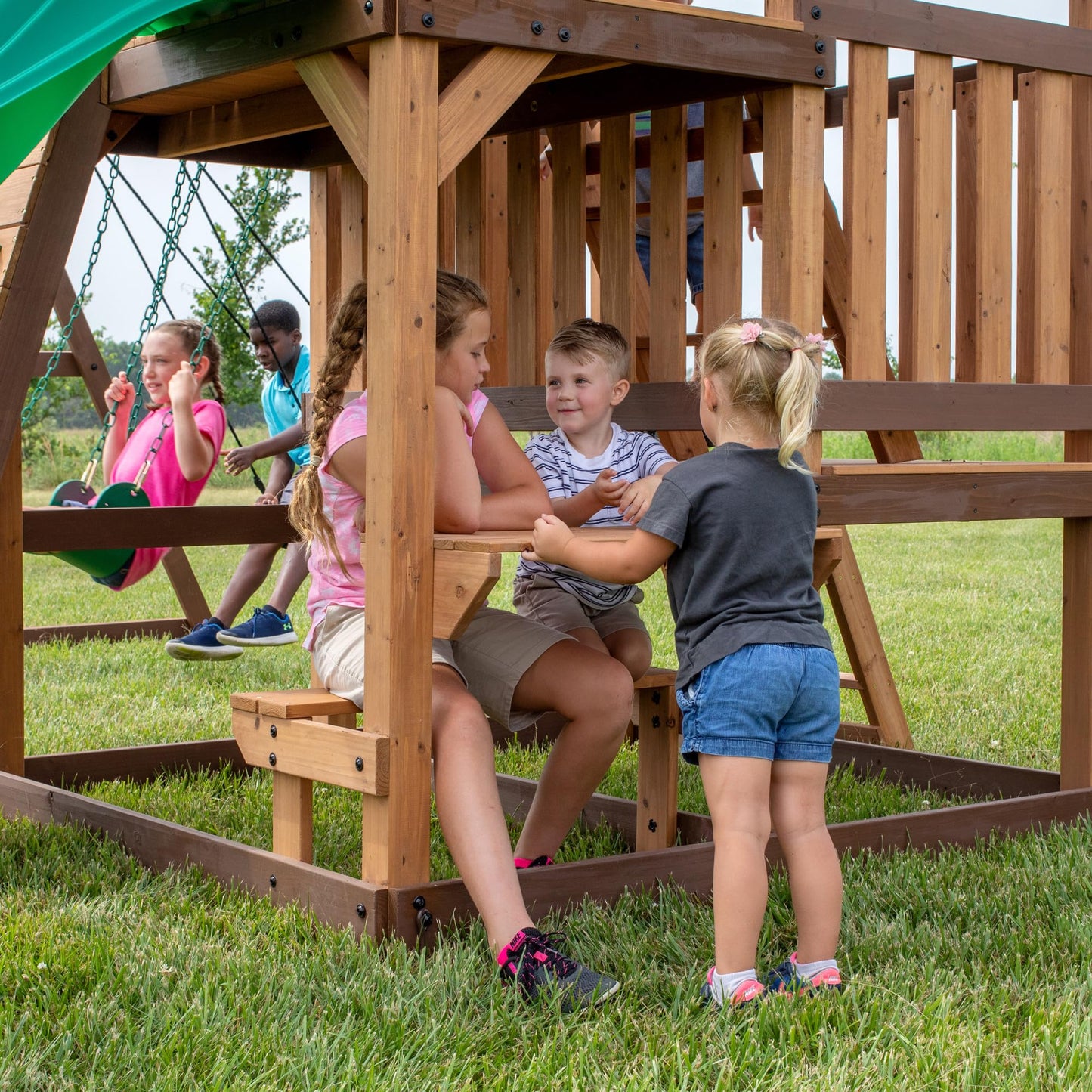 Backyard Discovery Highlander Cedar Wood Swing Set with Wave Slide, Three-Story Clubhouse, Rock Wall, Picnic Table, Belt Swings, Web Swing, Sandbox, Three Ladders, Toy Accessories, Outdoor Playset