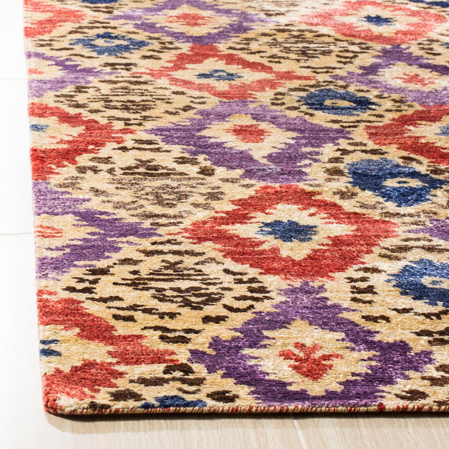 SAFAVIEH Luxor Collection Area Rug - 6' x 9', Purple & Rust, Handmade Ikat Design Banana Silk, Ideal for High Traffic Areas in Living Room, Bedroom (LUX161A)