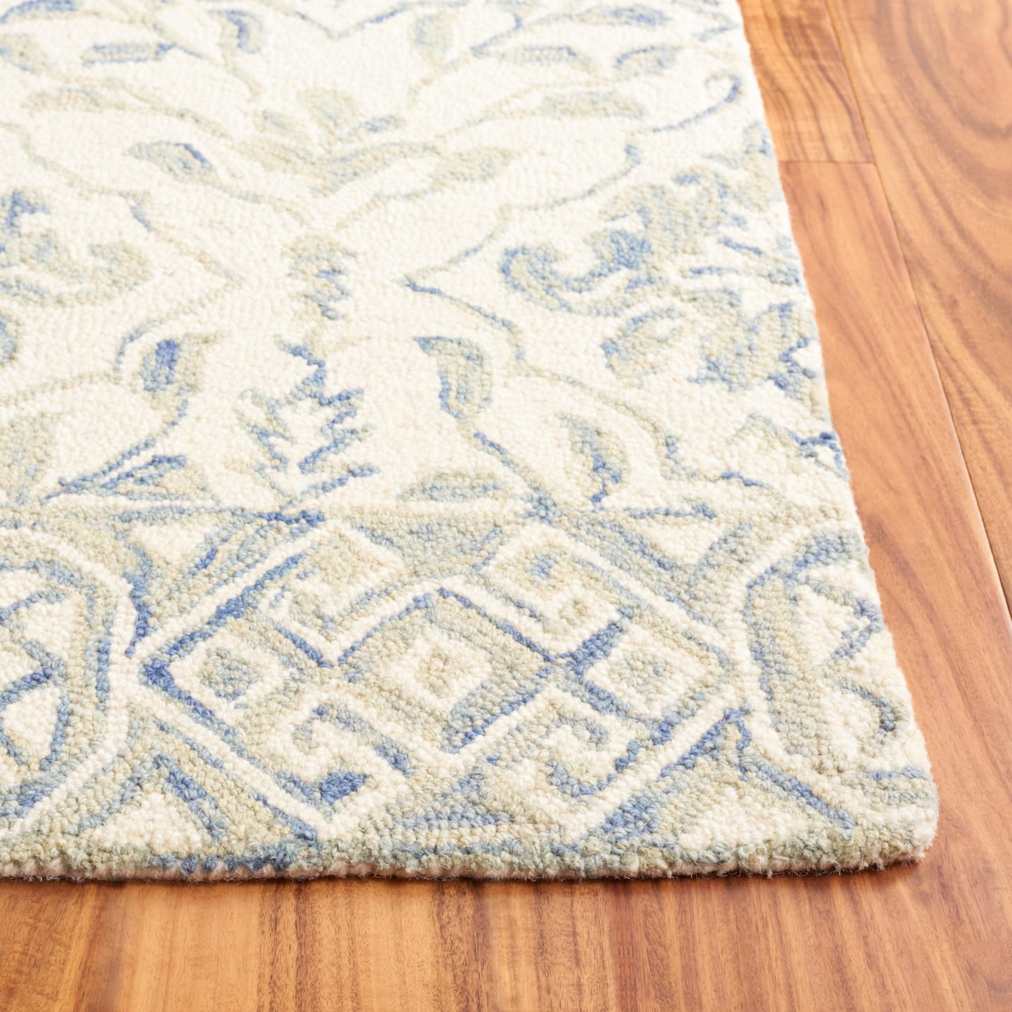 SAFAVIEH Dip Dye Collection Area Rug - 10' x 14', Light Blue & Ivory, Handmade Wool, Ideal for High Traffic Areas in Living Room, Bedroom (DDY901L)