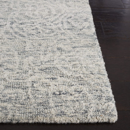 SAFAVIEH Area Rug 6x9 - Metro Collection - Dark Grey & Ivory, Handmade Wool, Ideal for Living Room, Bedroom, Dining Space (MET998H)