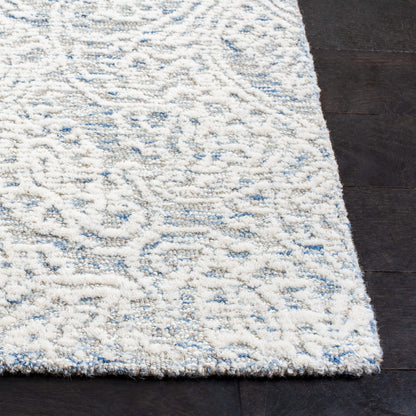 SAFAVIEH Area Rug 6x9 - Metro Collection - Light Blue & Ivory, Handmade Wool, Ideal for Living Room, Bedroom, Dining Space (MET998L)