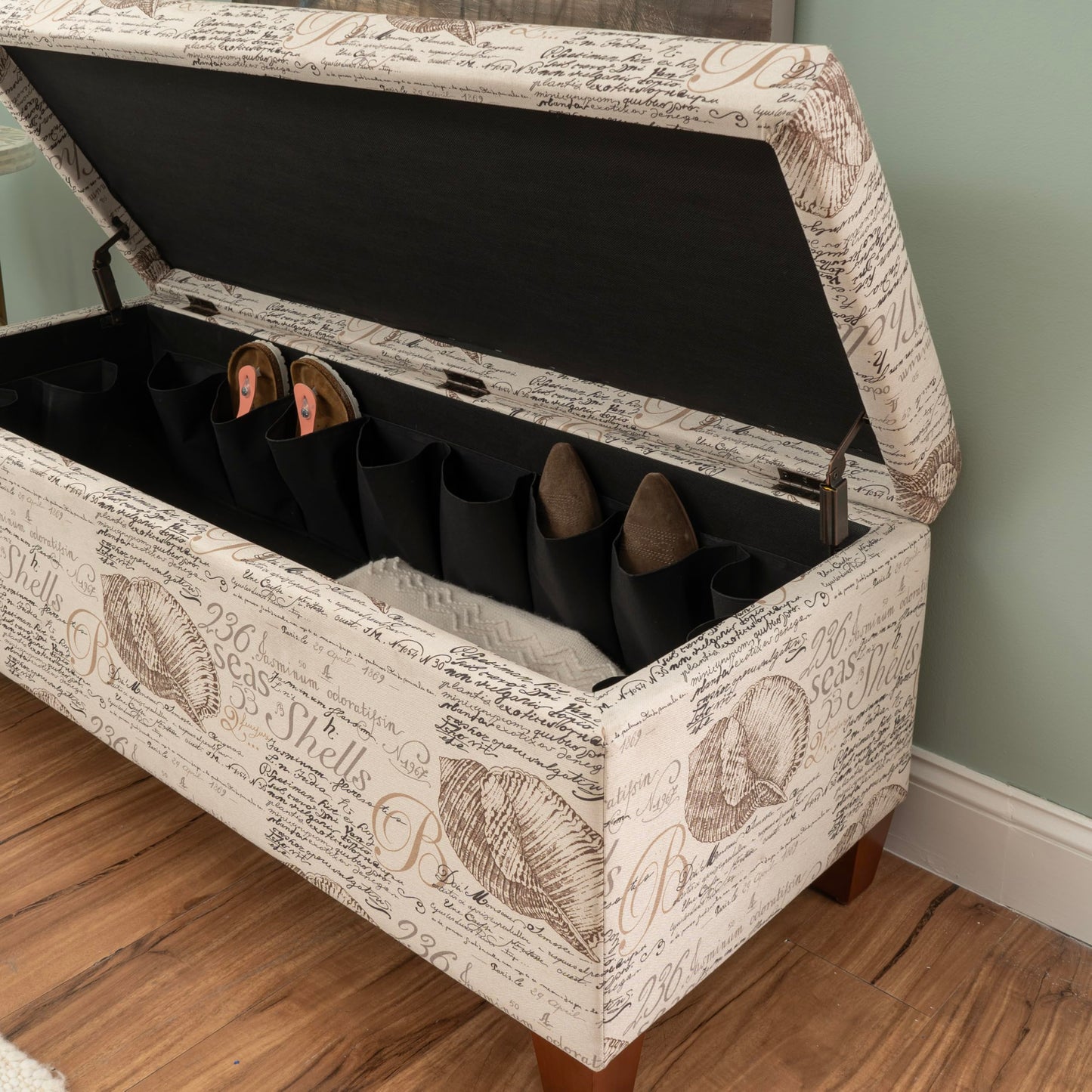 Linon Carmen Ivory and Beige Seashell Upholstered Lift Top Storage Ottoman with Wooden Feet
