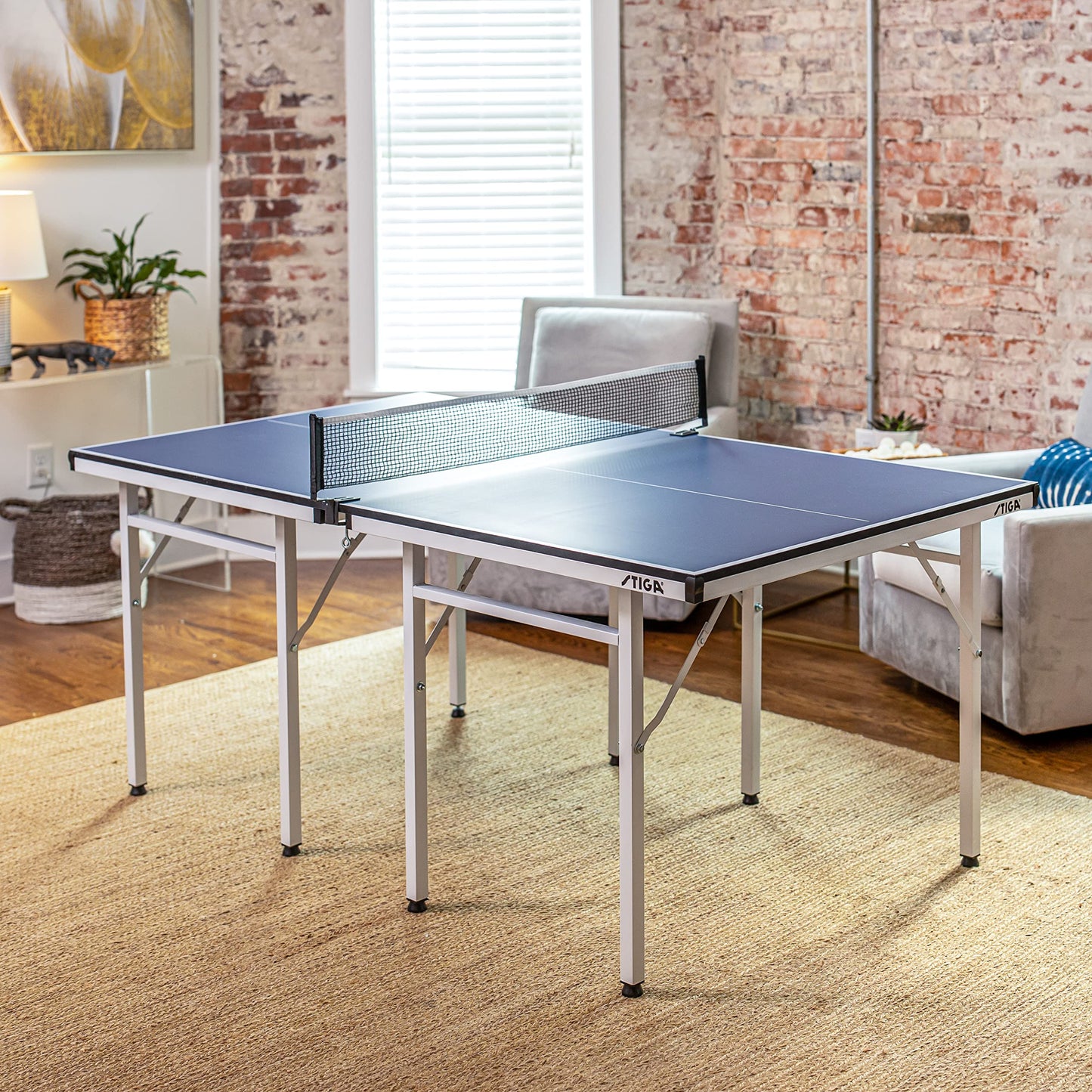 STIGA Space Saver - Mid-Size Portable Table Tennis Table - Compact Storage Fits in Most Closets – Includes Ping-Pong Net & Post - No Assembly Required
