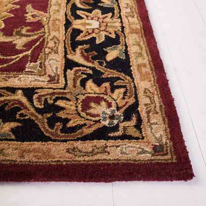 SAFAVIEH Heritage Collection Area Rug - 7'6" x 9'6", Red & Black, Handmade Traditional Oriental Wool, Ideal for High Traffic Areas in Living Room, Bedroom (HG628C)
