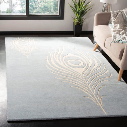 SAFAVIEH Soho Collection 7'6" x 9'6" Teal / Ivory SOH704T Handmade Premium Wool & Viscose Area Rug