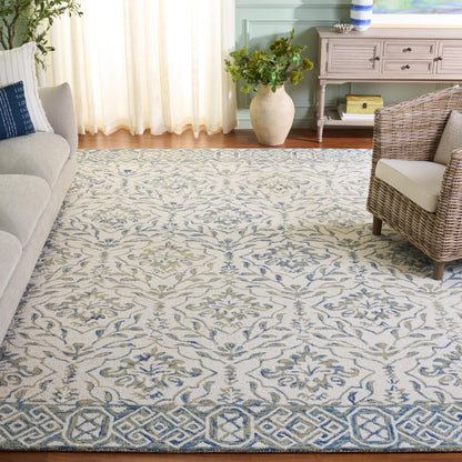 SAFAVIEH Dip Dye Collection Area Rug - 10' x 14', Light Blue & Ivory, Handmade Wool, Ideal for High Traffic Areas in Living Room, Bedroom (DDY901L)