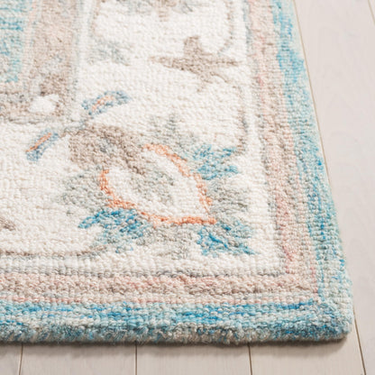 SAFAVIEH Area Rug 8x10 - Heritage Collection - Large - Light Blue & Ivory, Handmade Wool, Ideal for Living Room, Bedroom, Dining Space (HG125M)