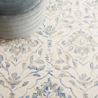 SAFAVIEH Dip Dye Collection Area Rug - 10' x 14', Light Blue & Ivory, Handmade Wool, Ideal for High Traffic Areas in Living Room, Bedroom (DDY901L)