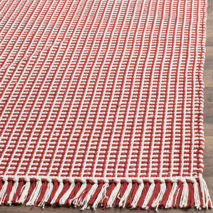 SAFAVIEH Montauk Collection Area Rug - 9' x 12', Ivory & Red, Handmade Flat Weave Boho Farmhouse Cotton Tassel Fringe, Ideal for High Traffic Areas in Living Room, Bedroom (MTK340C)