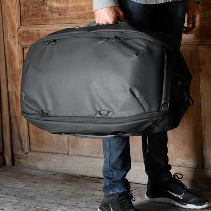 Peak Design Travel Duffelpack 45-65L, Black, Weatherproof Duffel Backpack, Expandable Design, Extra-Long Zip Path, Stowable Straps, Fits Packing Cubes and Camera Cubes, Versatile Duffel Bag for Travel
