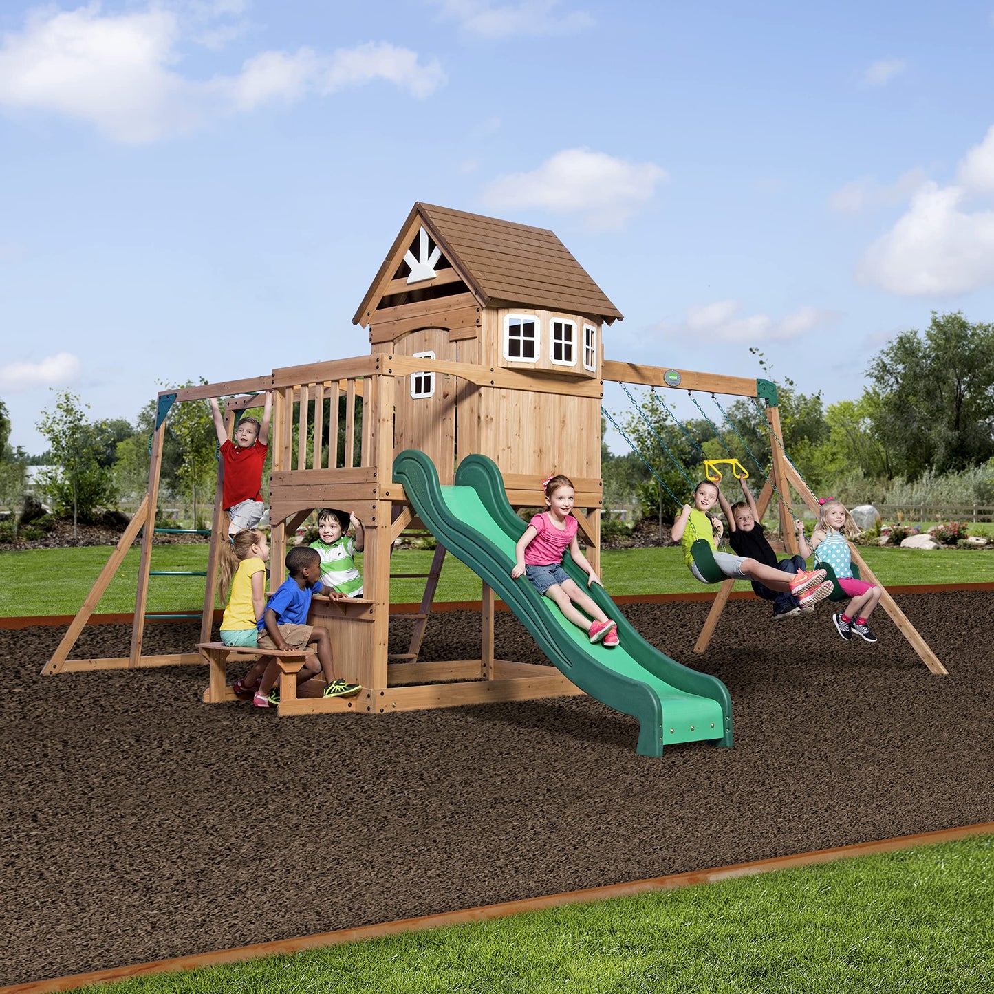 Backyard Discovery Montpelier Cedar Wood Swing Set, Wave Slide, Clubhouse, Monkey Bars, Picnic Area, Snack Bar, Belt Swings, Trapeze, Balcony, Playhouse, Working Door, Ladder, Outdoor Playset