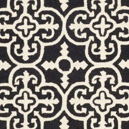 SAFAVIEH Cambridge Collection Area Rug - 9' x 12', Black & Ivory, Handmade Moroccan Wool, Ideal for High Traffic Areas in Living Room, Bedroom (CAM133E)