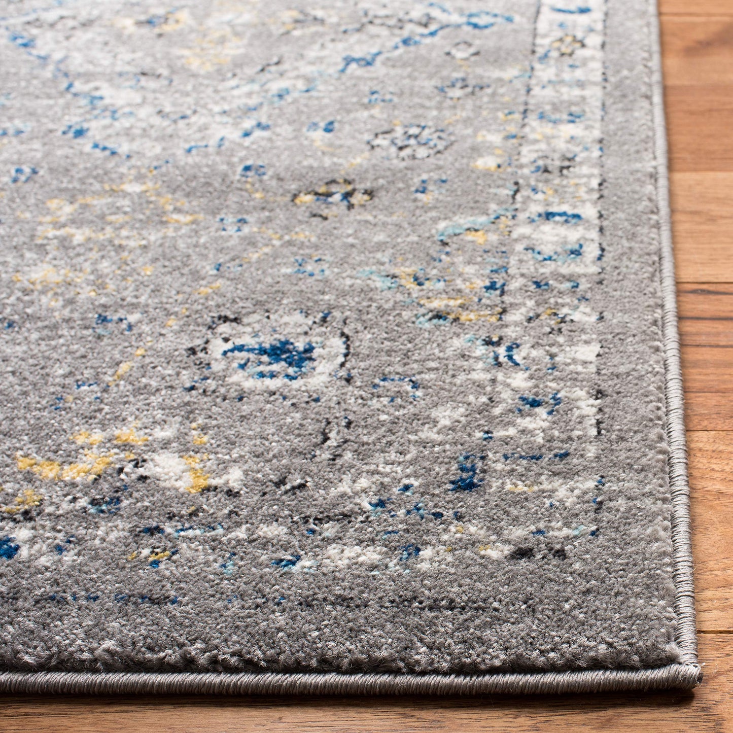 SAFAVIEH Evoke Collection Area Rug - 10' x 14', Dark Grey & Yellow, Boho Oriental Design, Non-Shedding & Easy Care, Ideal for High Traffic Areas in Living Room, Bedroom (EVK224G)